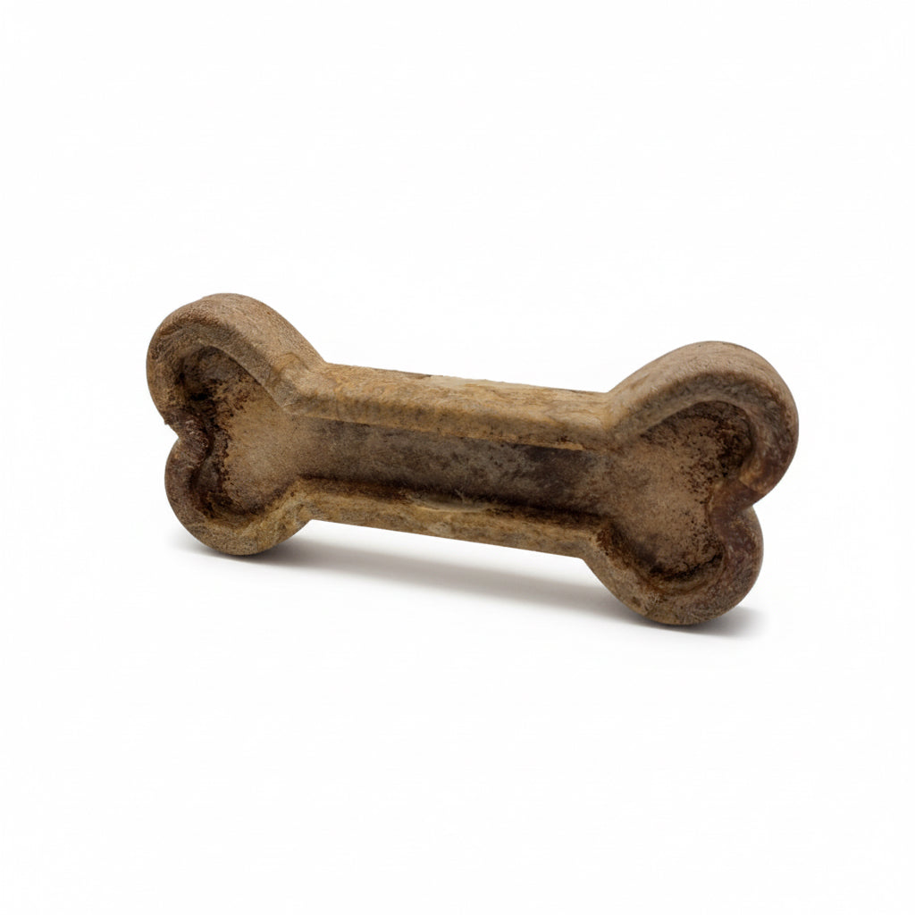 Brown bone-shaped dog toy on a white background